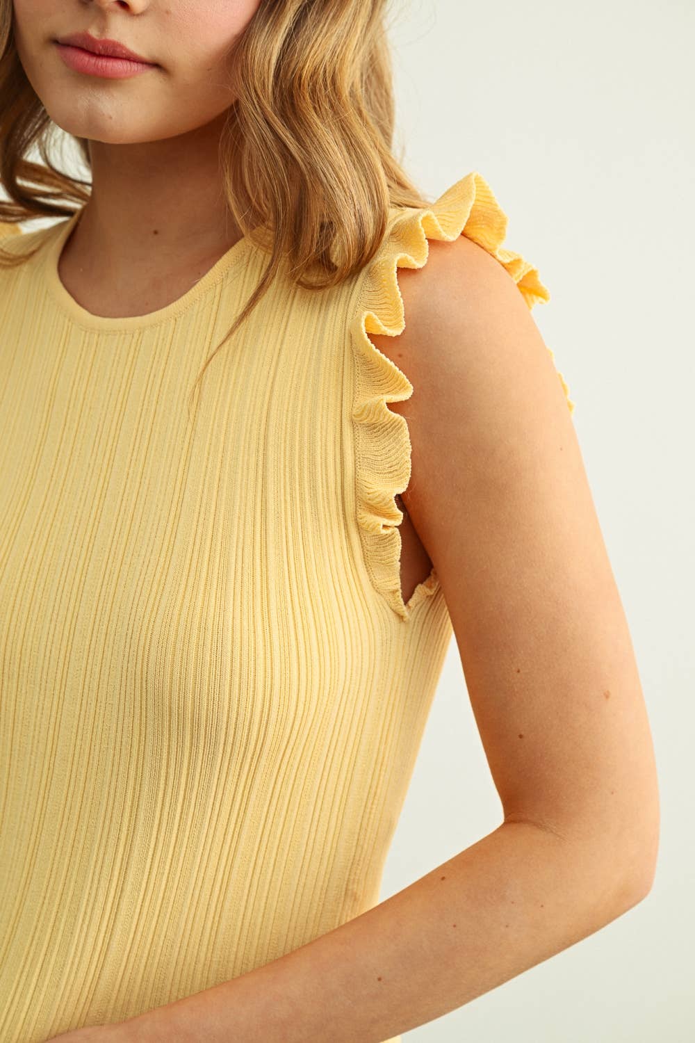 Custard Ribbed Knit Top With Ruffle