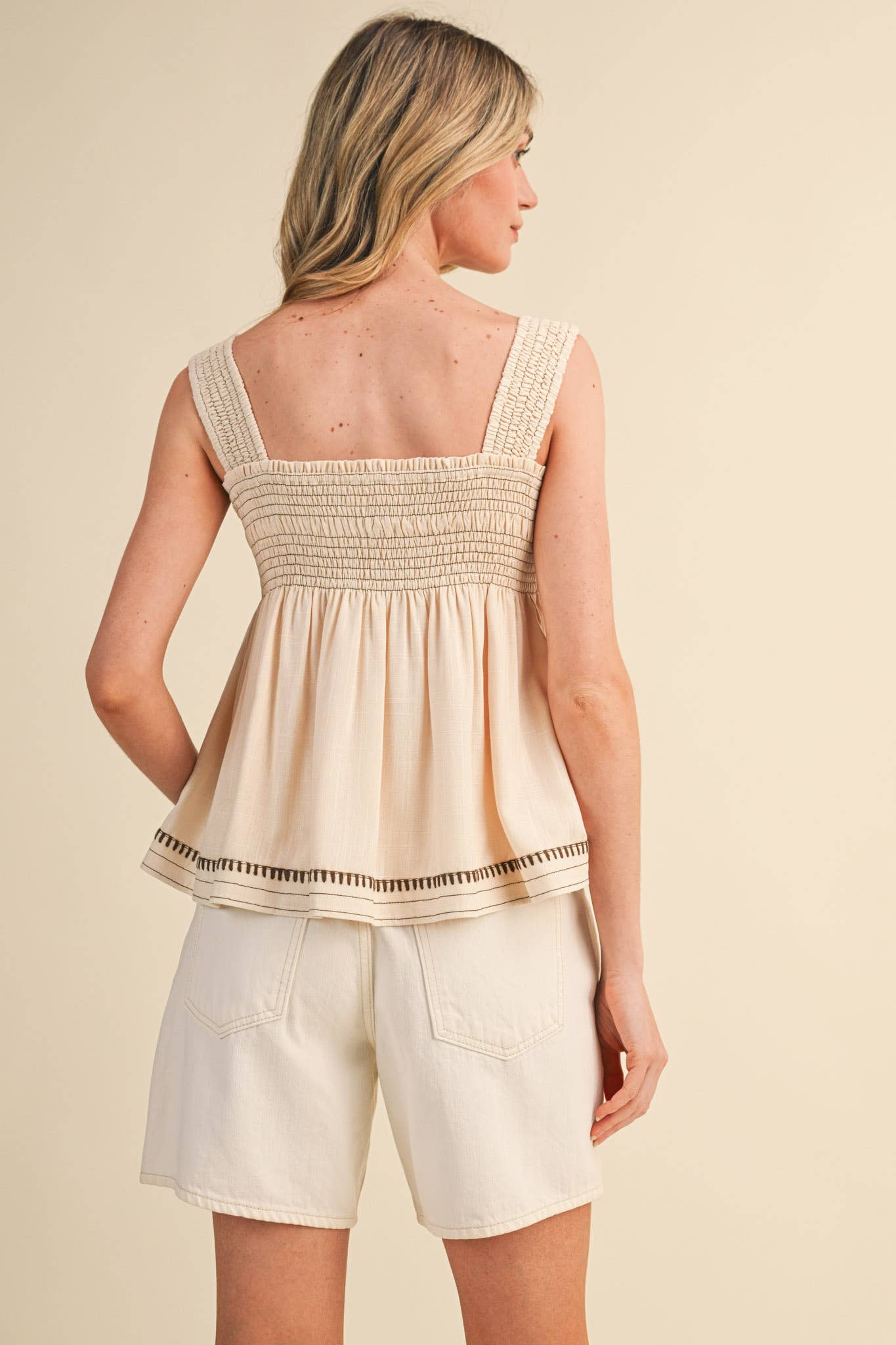 Egg Shell Sleeveless Smocked Swing Top