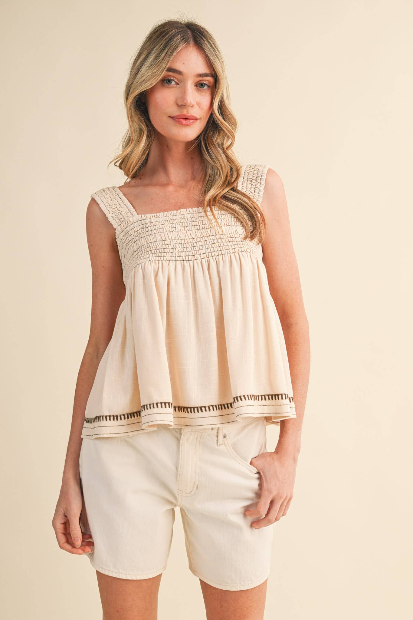 Egg Shell Sleeveless Smocked Swing Top