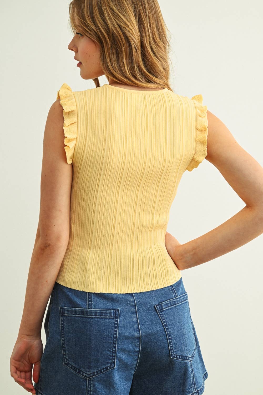 Custard Ribbed Knit Top With Ruffle