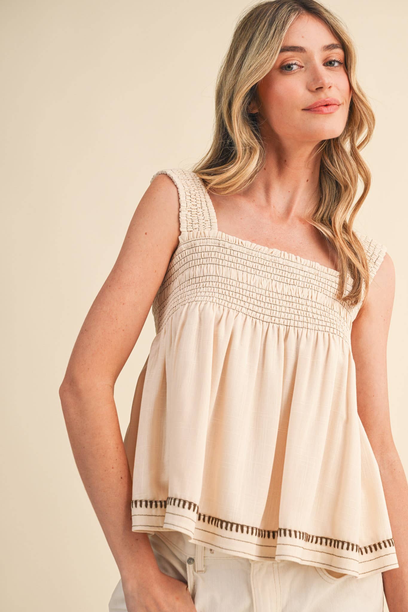 Egg Shell Sleeveless Smocked Swing Top