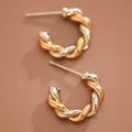 Gold Two Tone Twist Stainless Steel Hoop Earrings